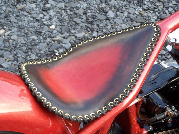 Hand made leather seat by DeVille.