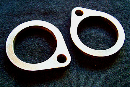 Shovelhead exhaust flanges from DeVille are precision laser cut from beefy 1/4 inch thick steel plate.