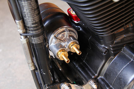 DeVille Spin-On Oil Filter Relocation Adapter installed on an Evo Sportster.