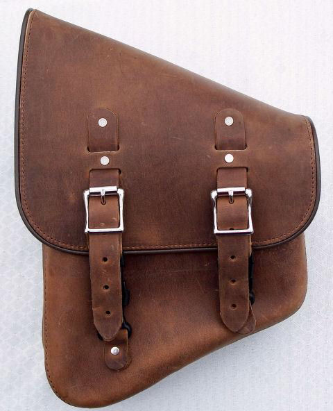 Example of a LEFT side Stash Bag from DeVille Cycles, in distressed brown leather.