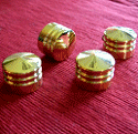 Solid brass head bolt covers for EVO and Twin Cam Harleys-Davidson.