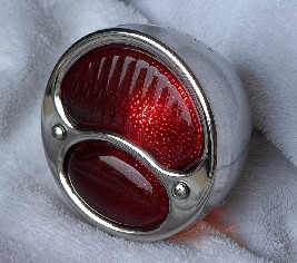 Classic Model A tail light, with solid red glass lens.