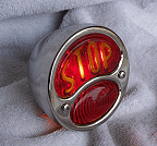Model A tail lights are available with your choice of solid red or "Stop" glass lens.